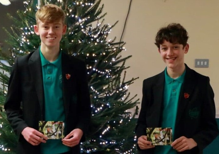 Heathfield Community College students holding cards