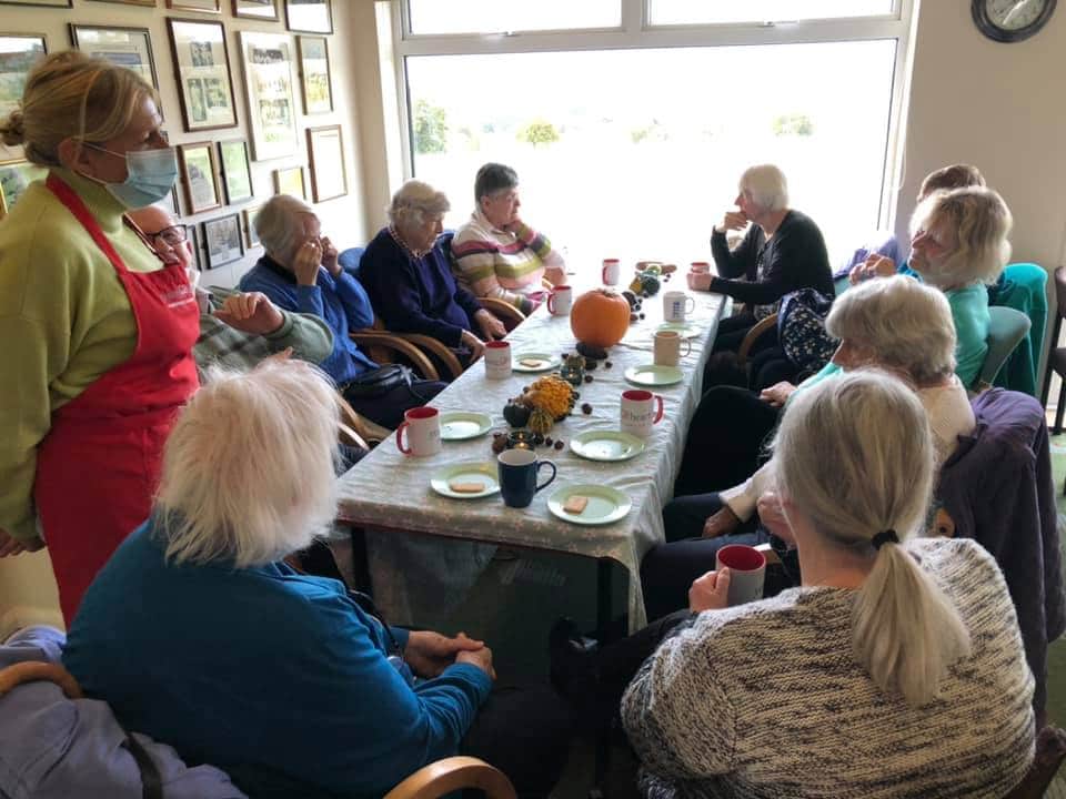 club members around table