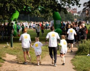 Family crossing finishing line