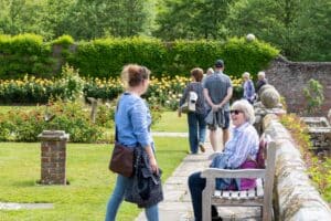 People in the gardens at Herstmonceux Castle