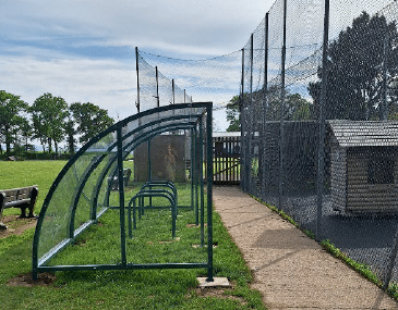 outdoor space with nets to stop balls in play area