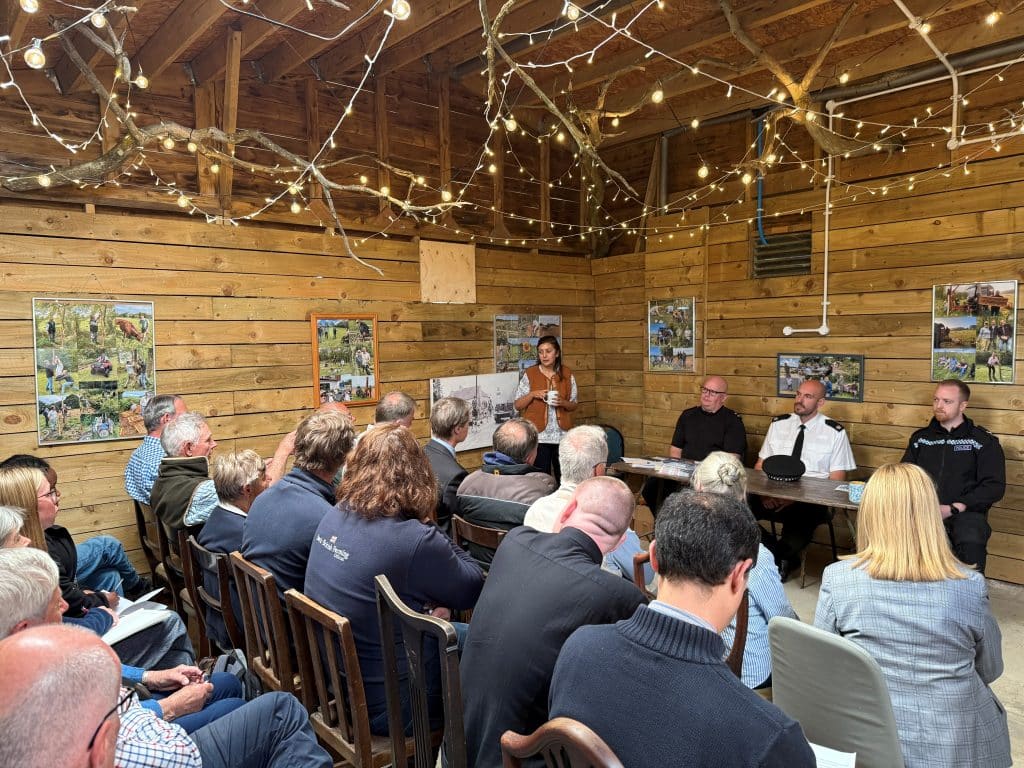Female MP hosting meeting with local farmers - male and female