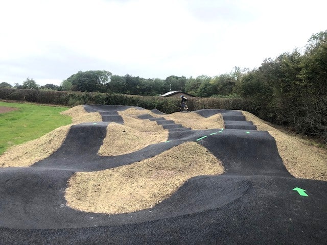 cycle track which is very windy and bumpy on dark road surface